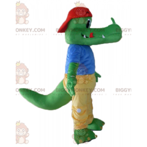 Grøn krokodille BIGGYMONKEY™ maskotkostume klædt i gult og blåt