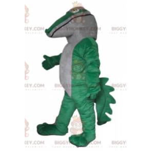 Obří a působivý kostým maskota zelenobílého krokodýla