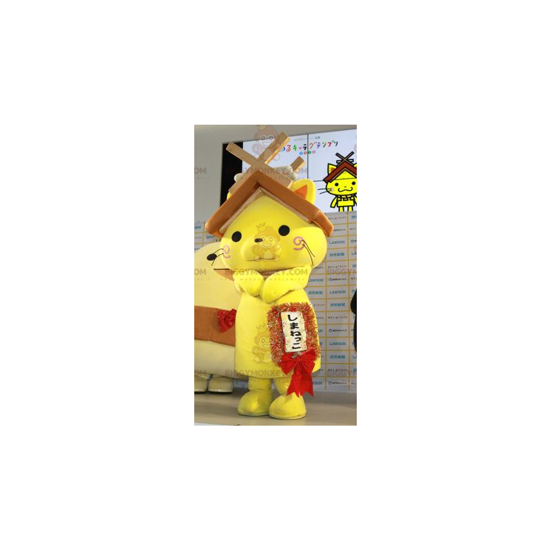 BIGGYMONKEY™ maskottiasu keltainen kissa talon katolla päässä -