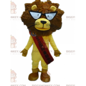 Kostium maskotki BIGGYMONKEY™ Żółto-brązowy lew w okularach -