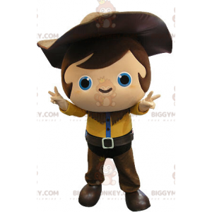 Cowboy Child BIGGYMONKEY™ maskottiasu keltaisella ja ruskealla