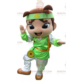 Brun pojke BIGGYMONKEY™ maskotdräkt med grön och vit outfit -