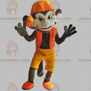 Ruskean apinan BIGGYMONKEY™ maskottiasu oranssilla asulla. Abu