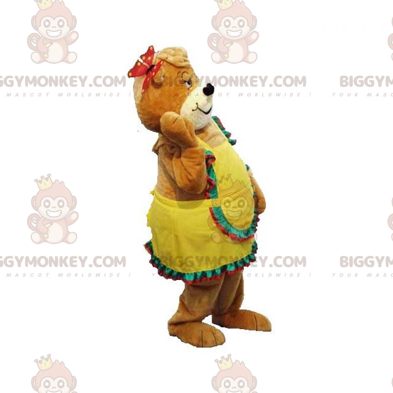 Ruskea Teddy BIGGYMONKEY™ maskottiasu keltaisella mekolla -