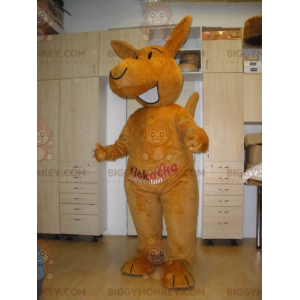 Traje de mascote canguru laranja gigante sorridente