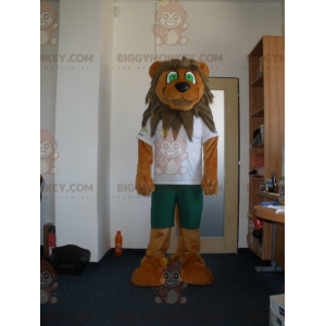 Brązowo-podpalany kostium maskotka lew z zielonymi oczami