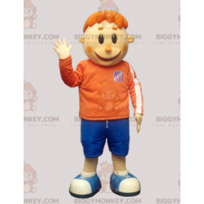 Kostium maskotki Rudy chłopiec BIGGYMONKEY™ w odzieży sportowej